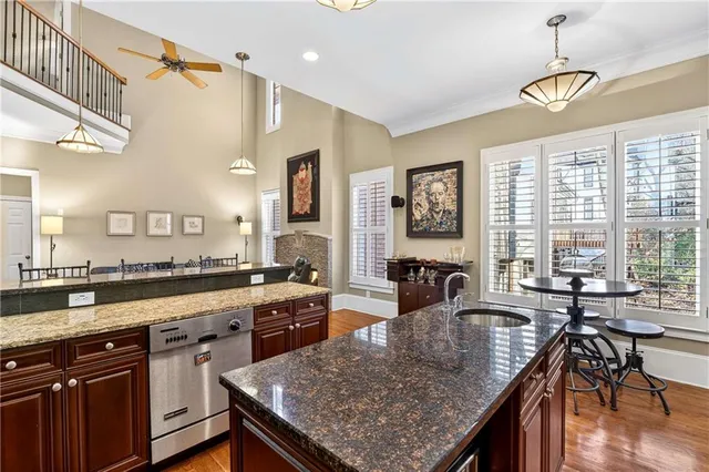 a spacious bedroom with a bed and a fireplace