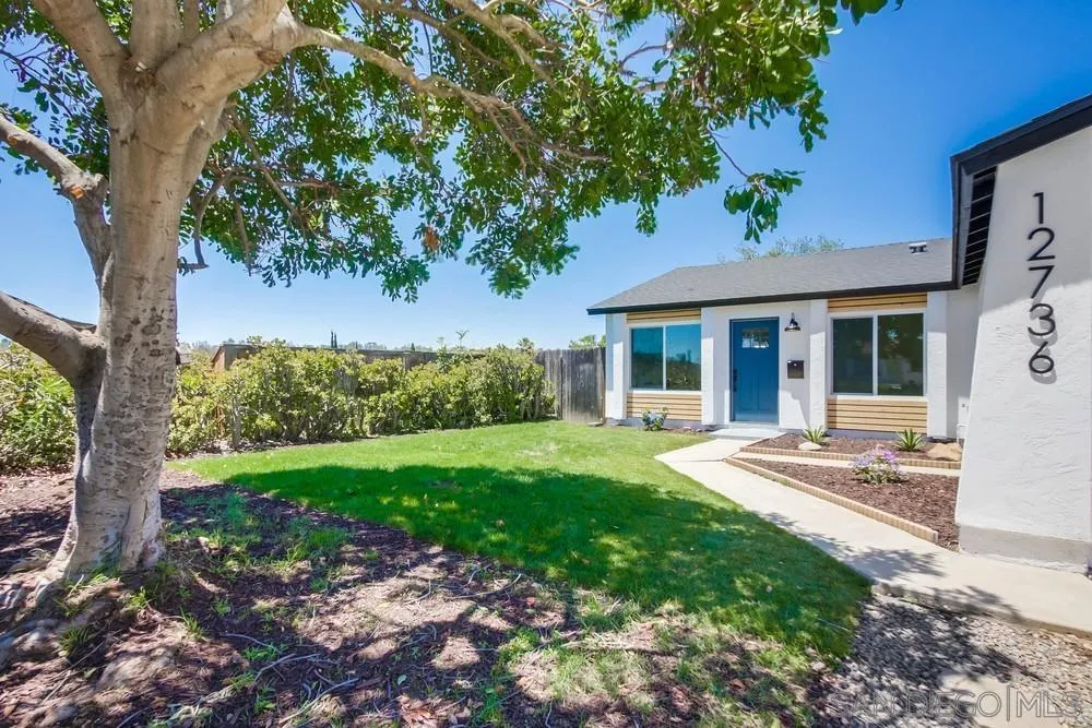 12736 Roberto Way Poway, CA 92064 - Photo 1 of 34 a front view of a house with garden