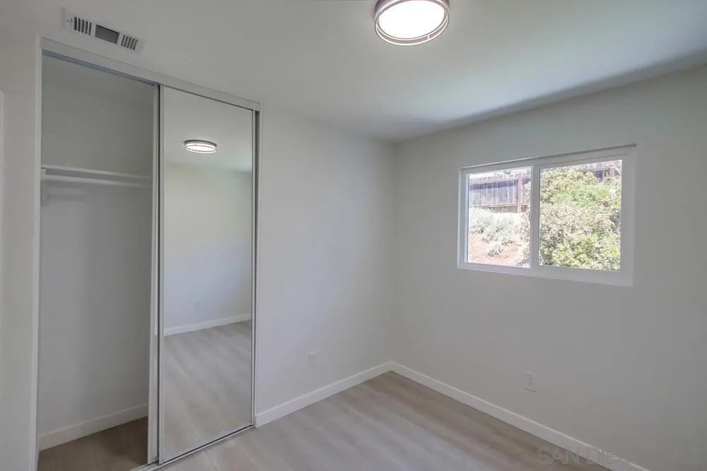 12736 Roberto Way Poway, CA 92064 - Photo 19 of 34 an empty room with a window