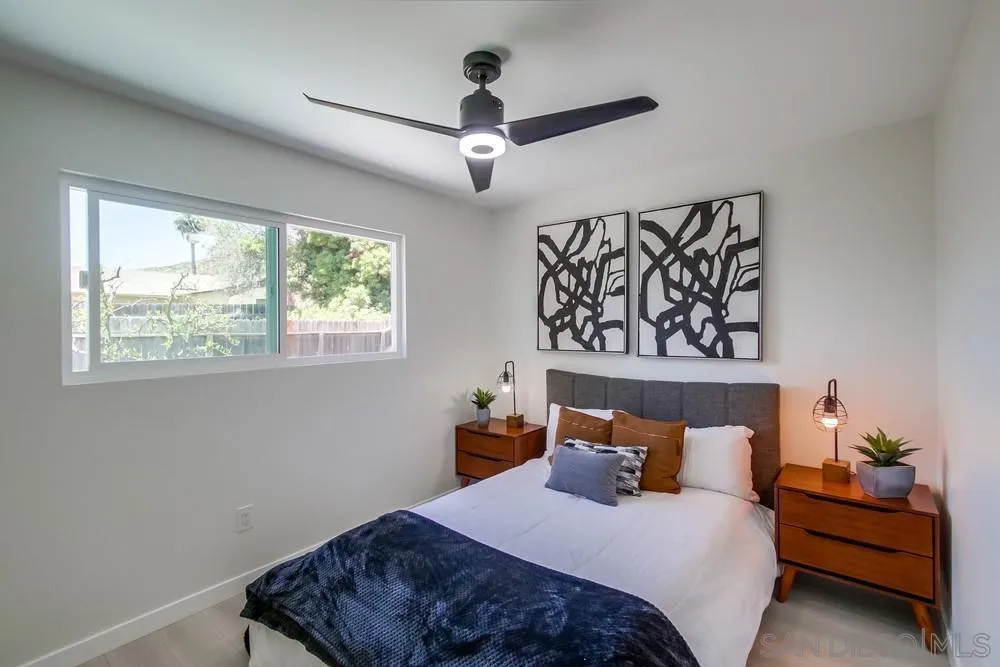12736 Roberto Way Poway, CA 92064 - Photo 20 of 34 a bedroom with bed and a window