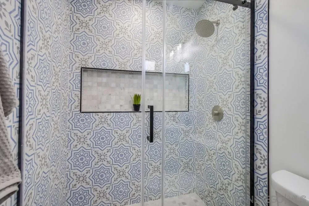 12736 Roberto Way Poway, CA 92064 - Photo 24 of 34 a bathroom with a shower