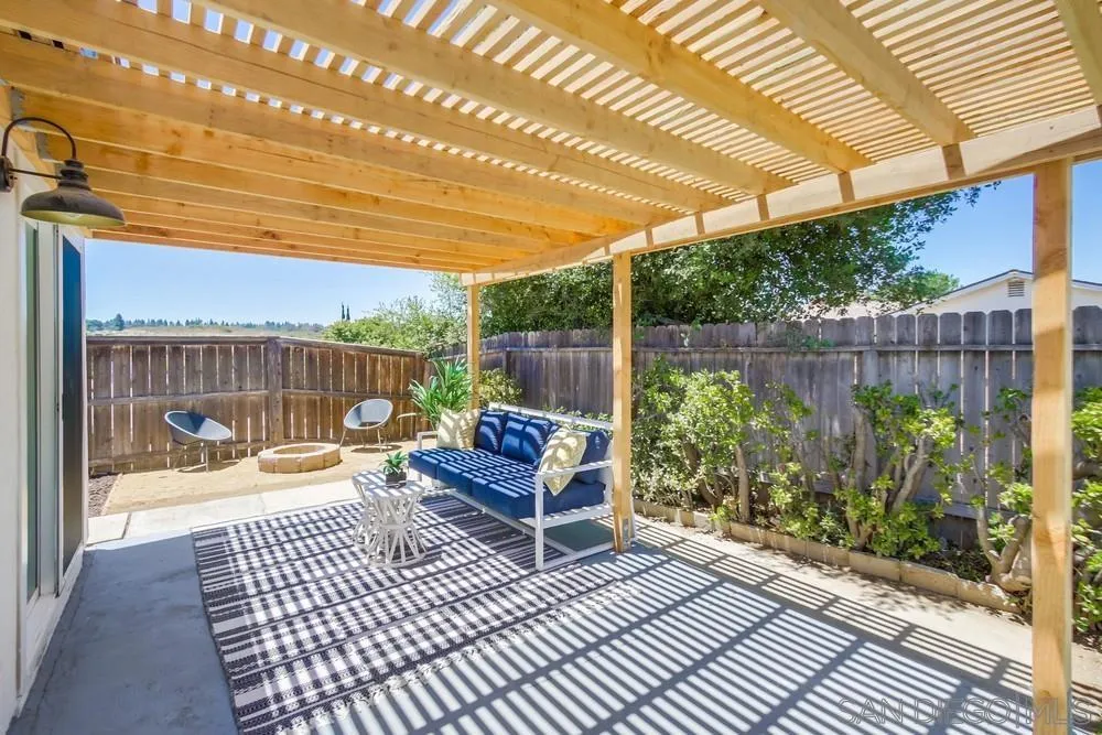 12736 Roberto Way Poway, CA 92064 - Photo 27 of 34 a view of a patio with a table and chairs