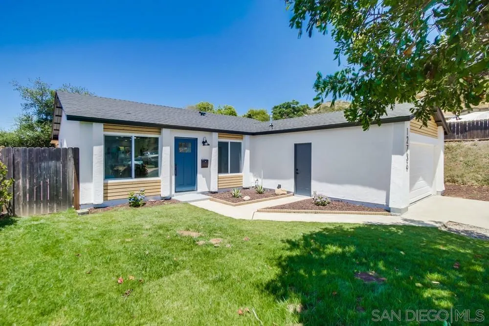 12736 Roberto Way Poway, CA 92064 - Photo 3 of 34 a view of a house with backyard and sitting area
