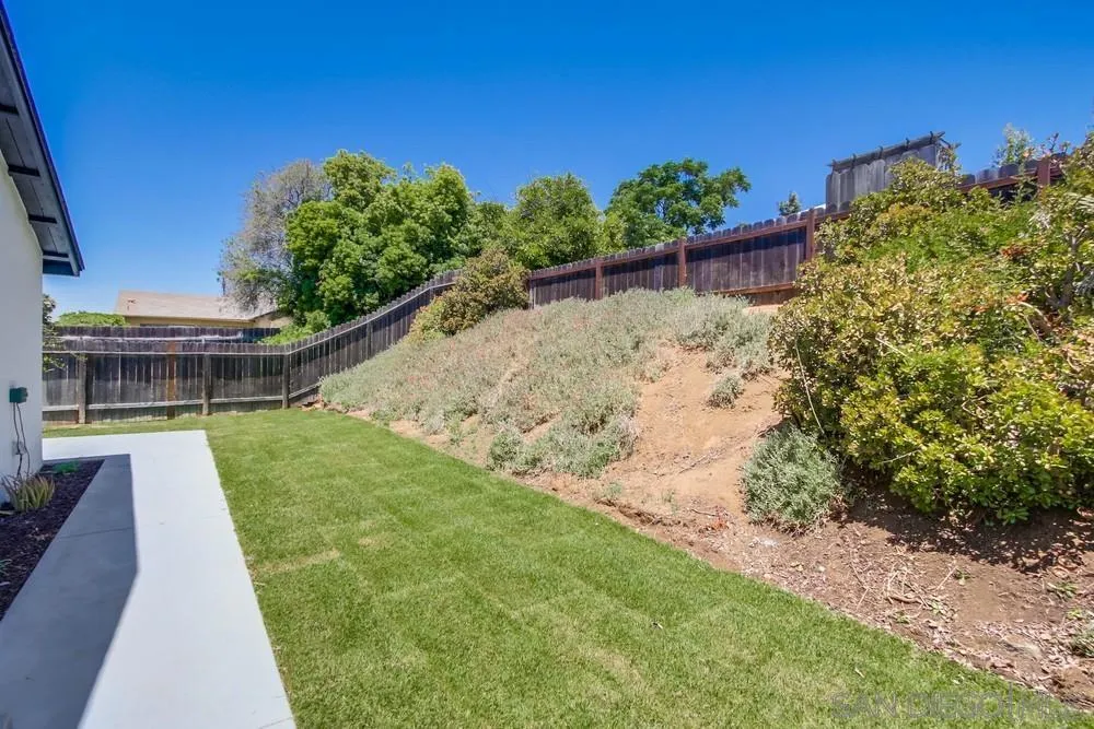 12736 Roberto Way Poway, CA 92064 - Photo 33 of 34 a view of a backyard with a garden