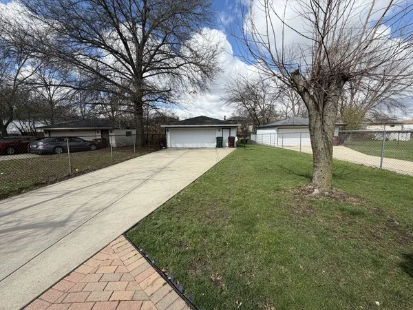 a house with yard in front of it