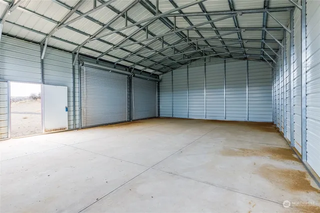 a view of a room with wooden walls