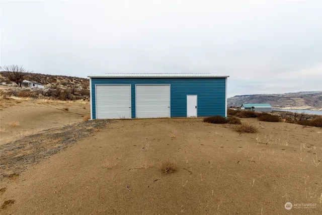 a view of a backyard of the house
