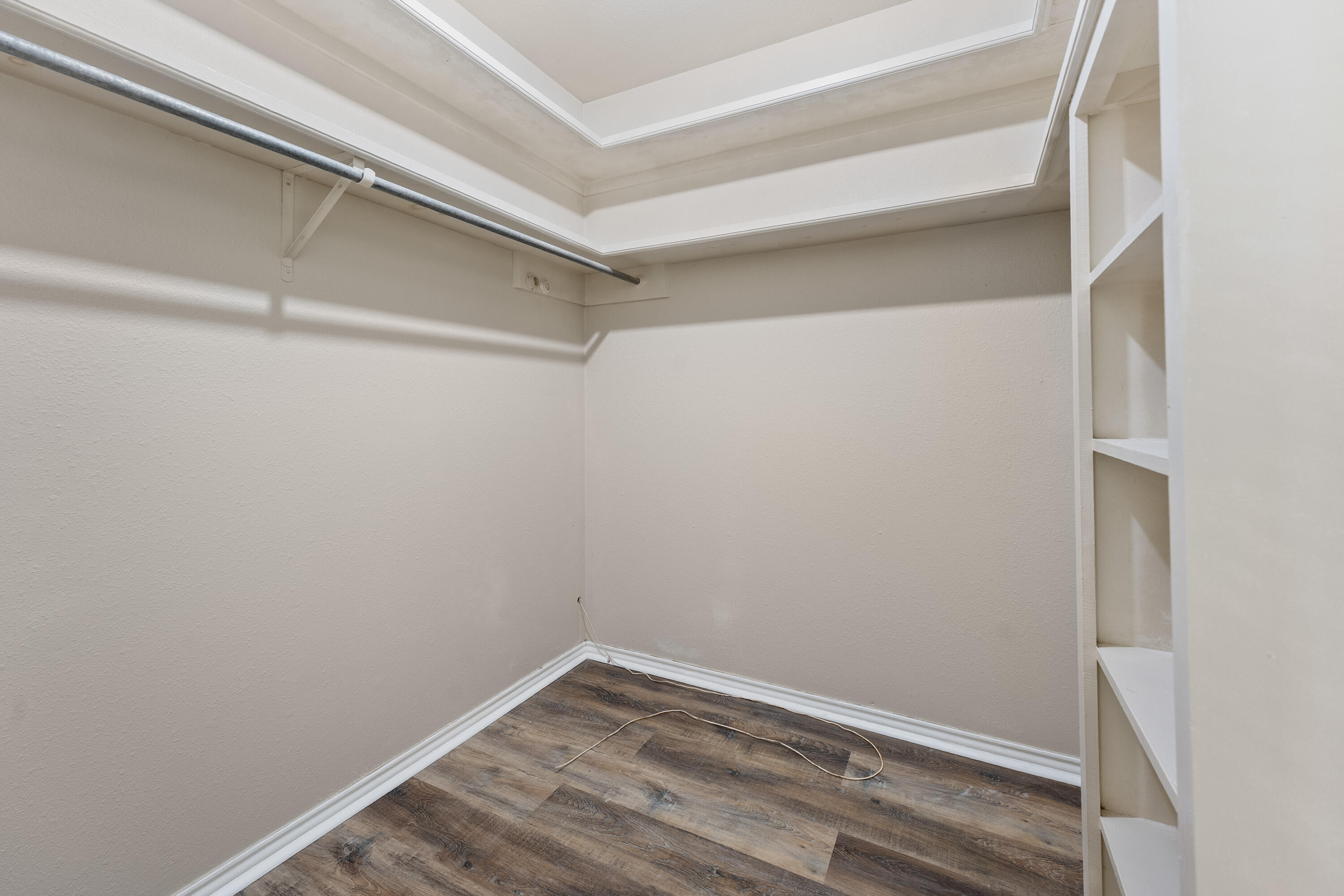 7902 Lynnhaven Avenue Lubbock, TX 79423 - Photo 29 of 35 a view of an empty walk in closet