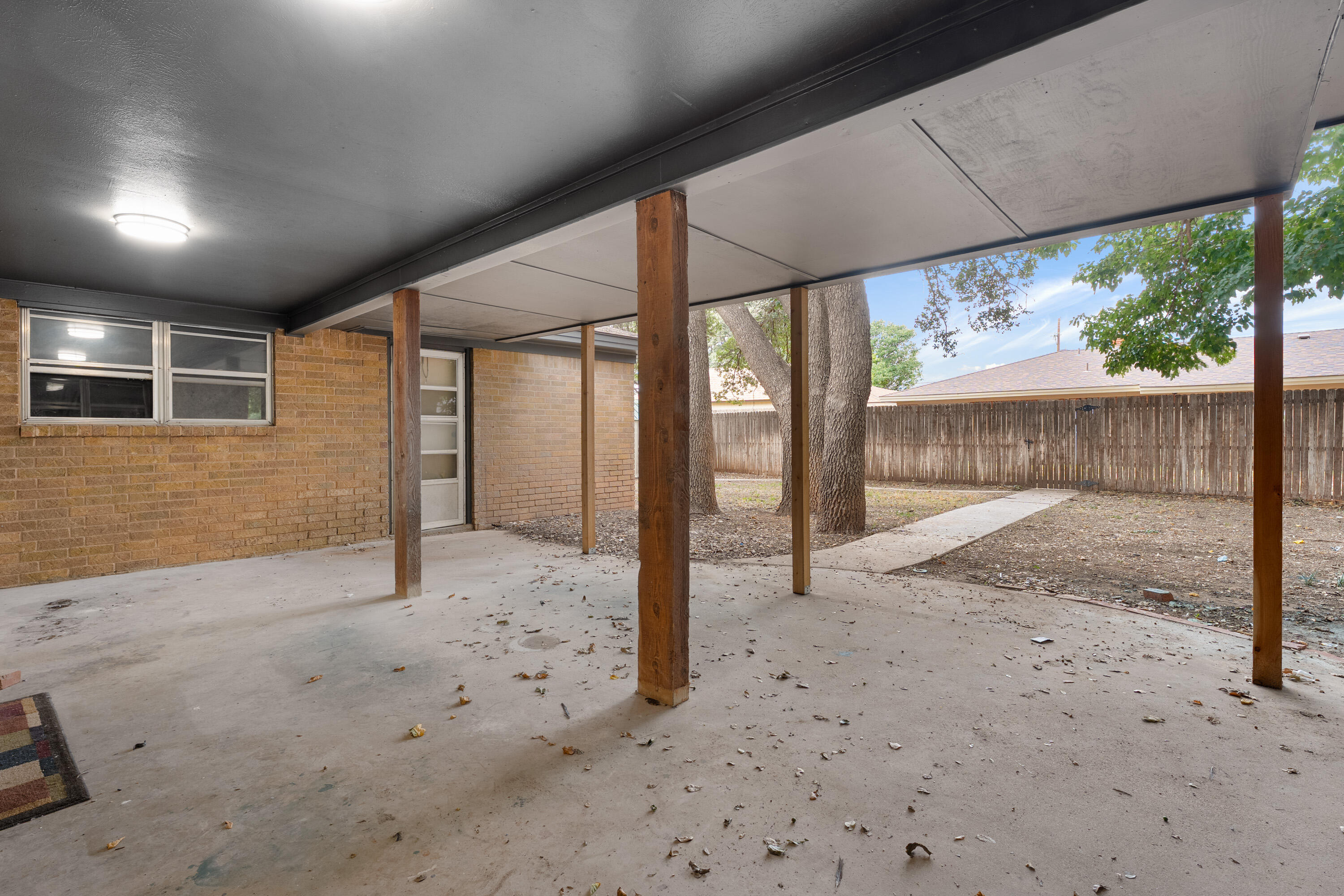 7902 Lynnhaven Avenue Lubbock, TX 79423 - Photo 32 of 35 a view of backyard of the house