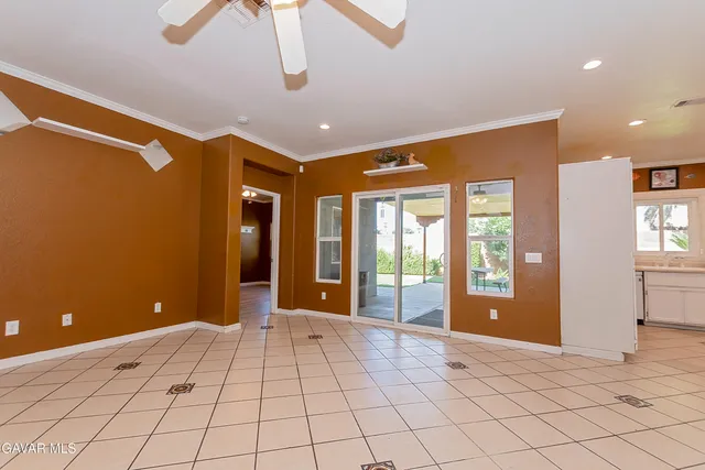 a bedroom with a bed and a view of bathroom