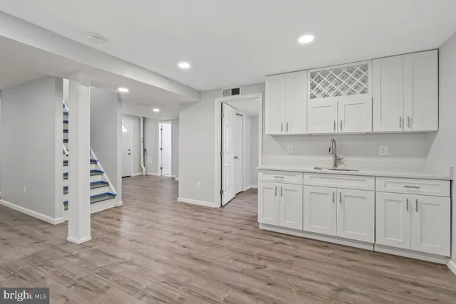 a view of kitchen with wooden floor