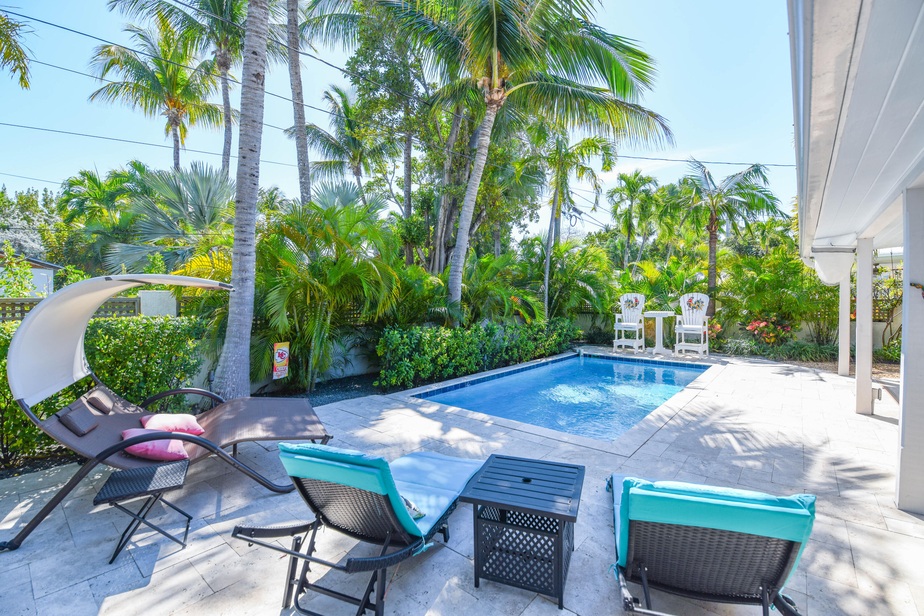 1720 Patricia Street Key West, FL 33040 - Photo 15 of 46 a view of a backyard with plants and chairs