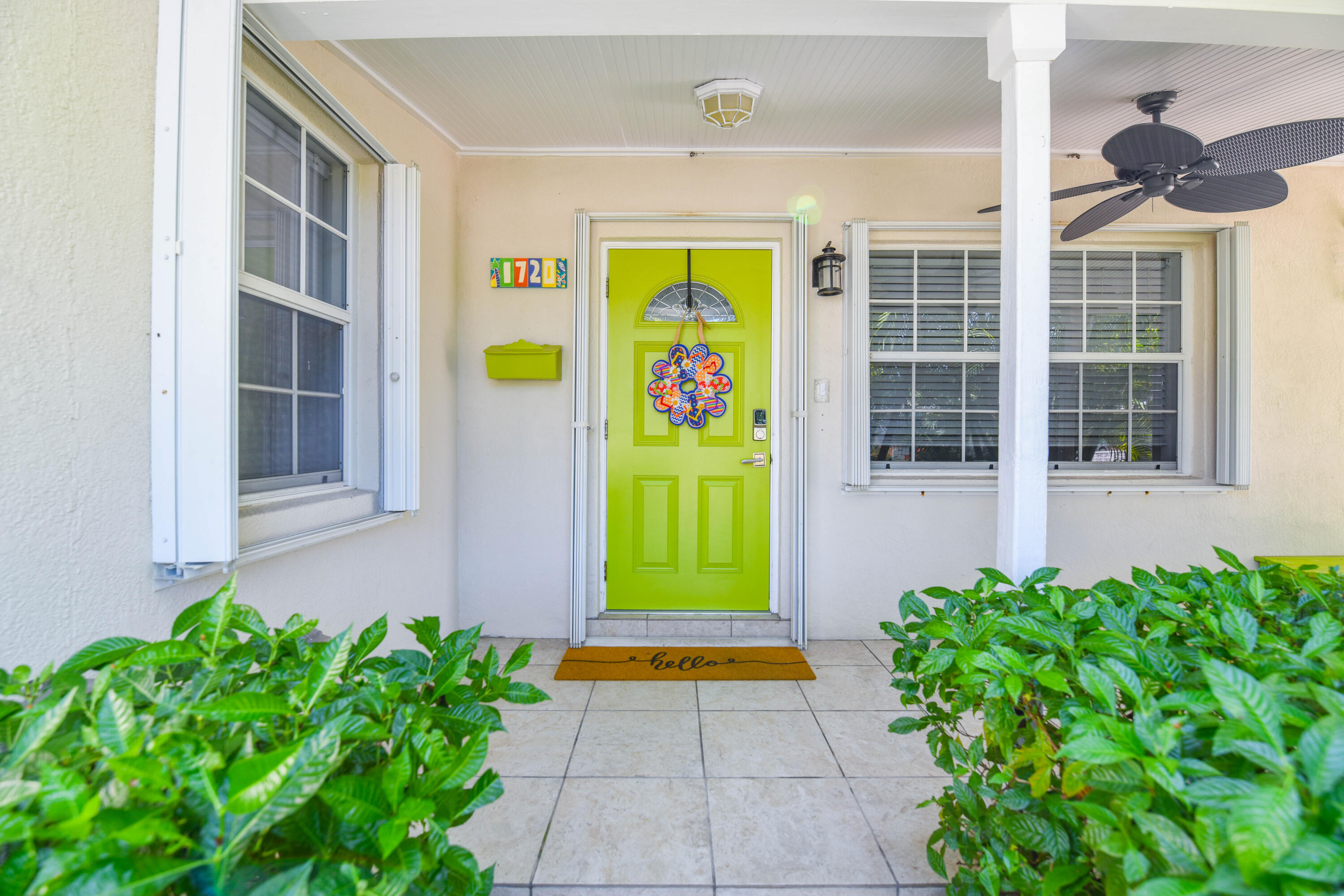 1720 Patricia Street Key West, FL 33040 - Photo 20 of 46 a view of front door of house with potted plants