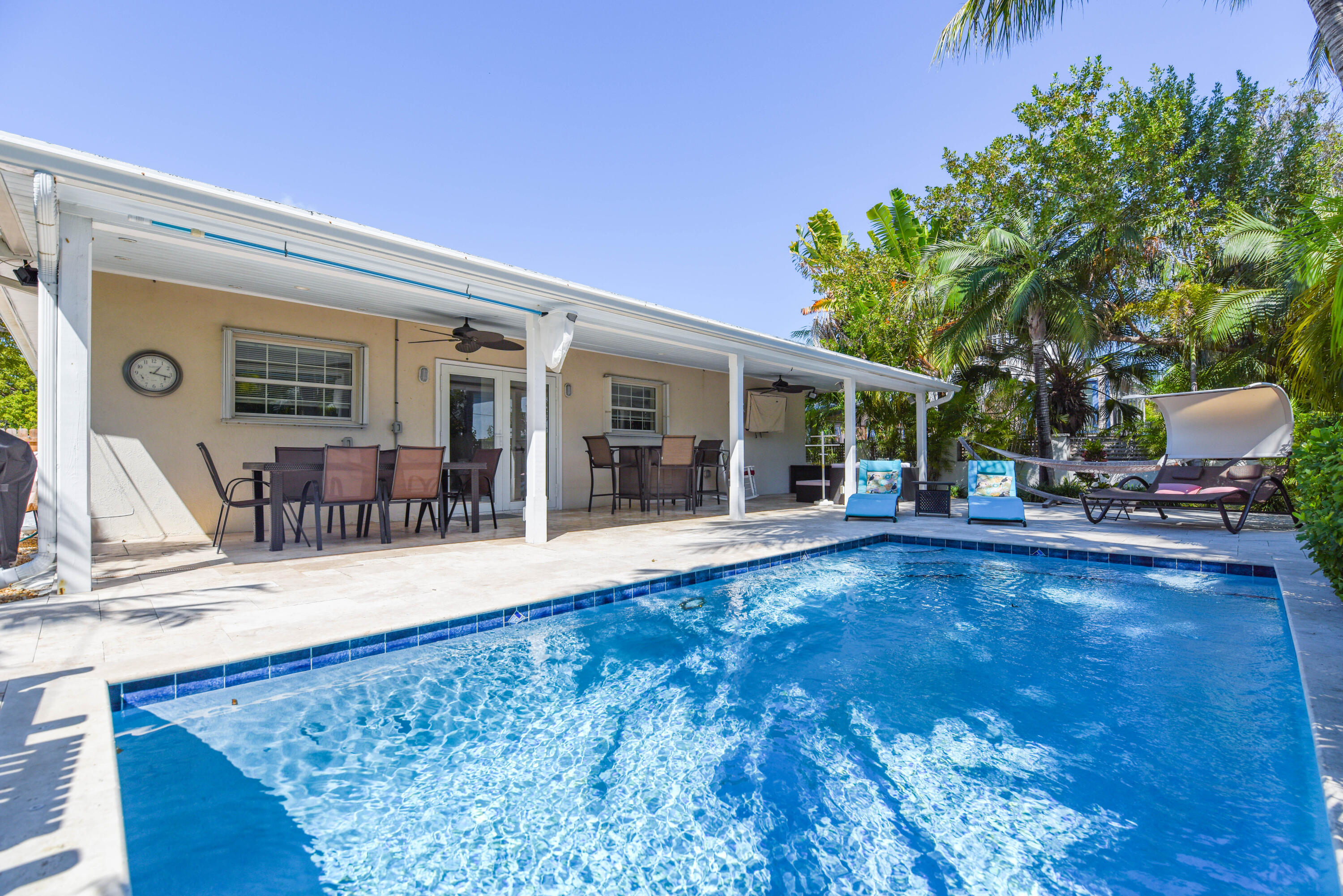 1720 Patricia Street Key West, FL 33040 - Photo 28 of 46 a view of a house with backyard porch and patio