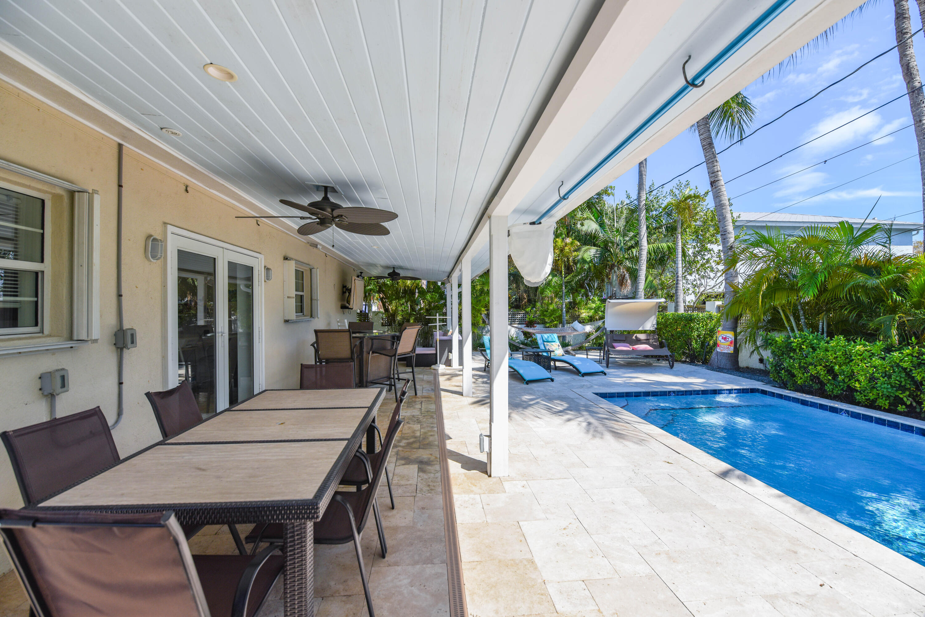 1720 Patricia Street Key West, FL 33040 - Photo 9 of 46 a view of a patio with a table chairs and a backyard