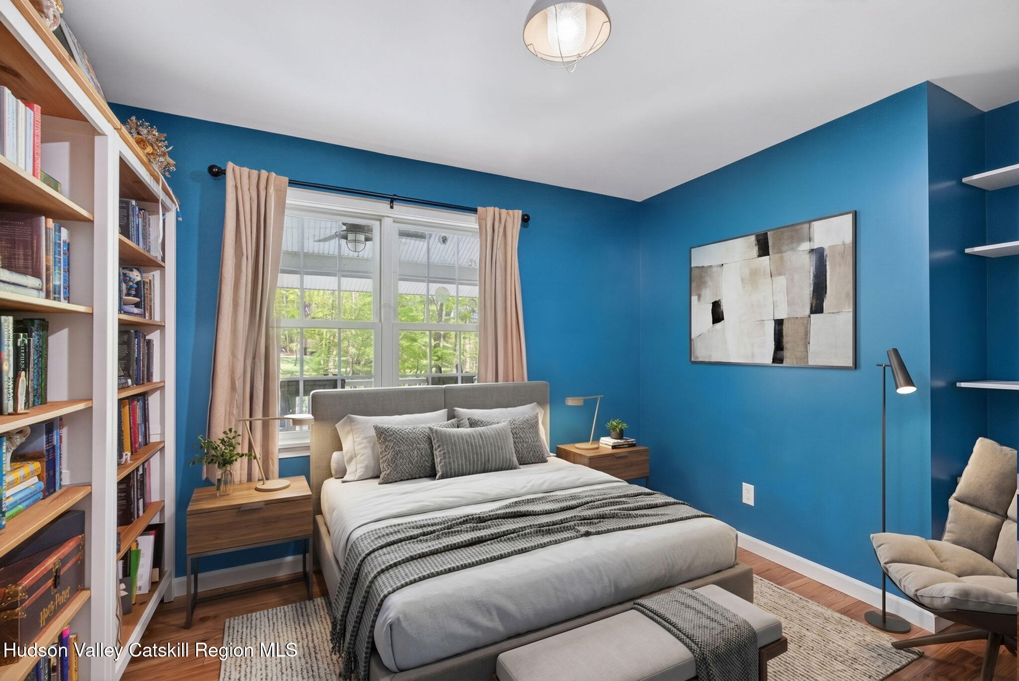 322 Morrison Road Acra, NY 12405 - Photo 27 of 49 a bedroom with a bed and a book shelf
