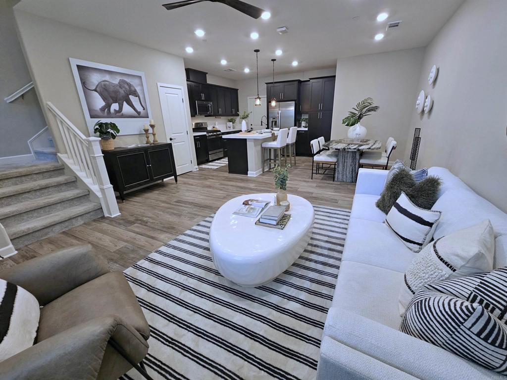 1118 Delpy View Point Vista, CA 92084 - Photo 2 of 24 a living room with furniture and a flat screen tv