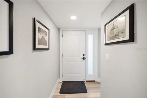 a view of room with window and wall painting