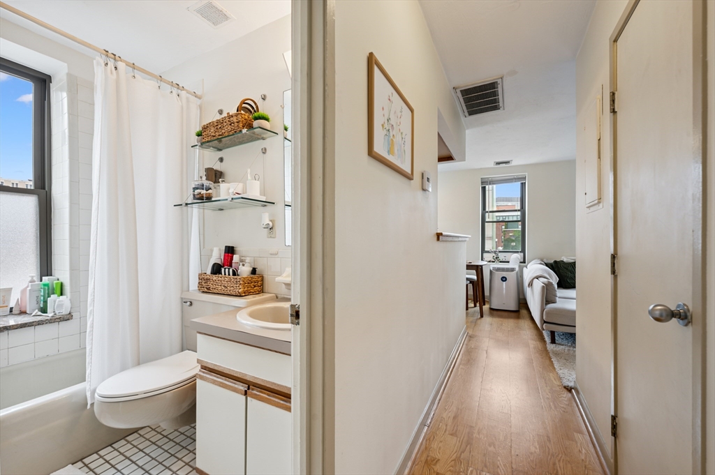 5 Grove Street, Unit 9 Boston, MA 02114 - Photo 13 of 24 a bathroom with a sink and a toilet