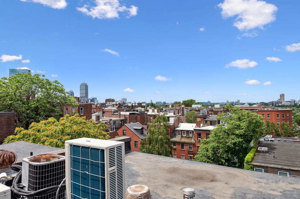 5 Grove Street, Unit 9 Boston, MA 02114 - Photo 18 of 24 a picture of city view
