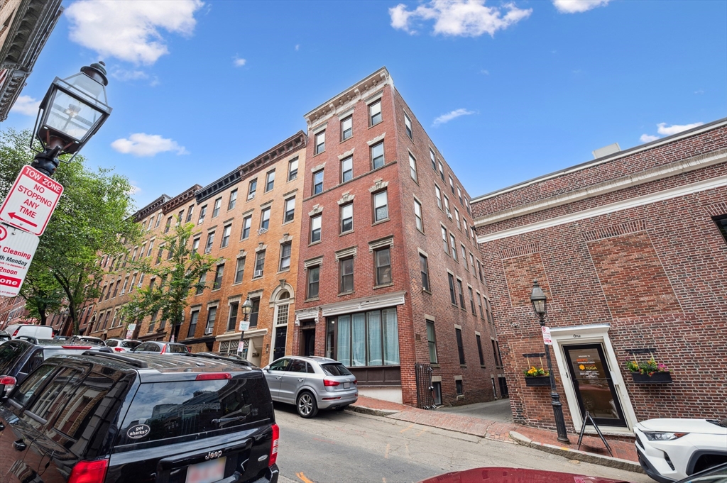 5 Grove Street, Unit 9 Boston, MA 02114 - Photo 20 of 24 a view of a building