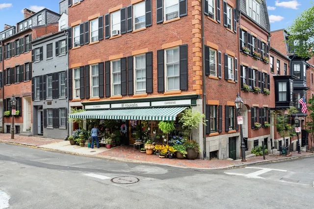 a front view of a building with street view