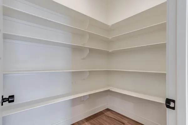 a view of an empty walk in closet