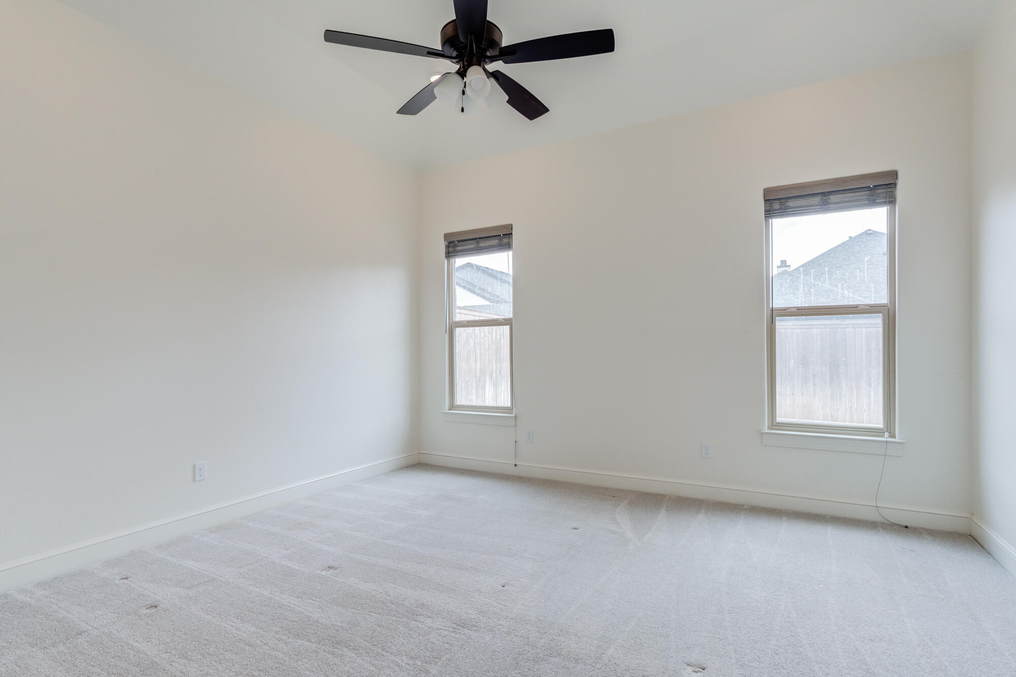 7603 52nd Street Lubbock, TX 79407 - Photo 26 of 46 an empty room with windows