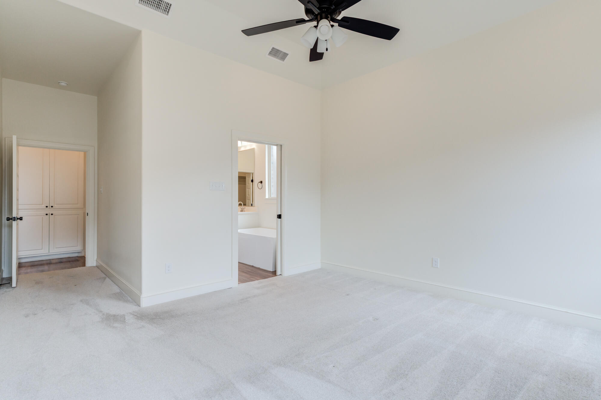 7603 52nd Street Lubbock, TX 79407 - Photo 27 of 46 a view of a room with a ceiling fan