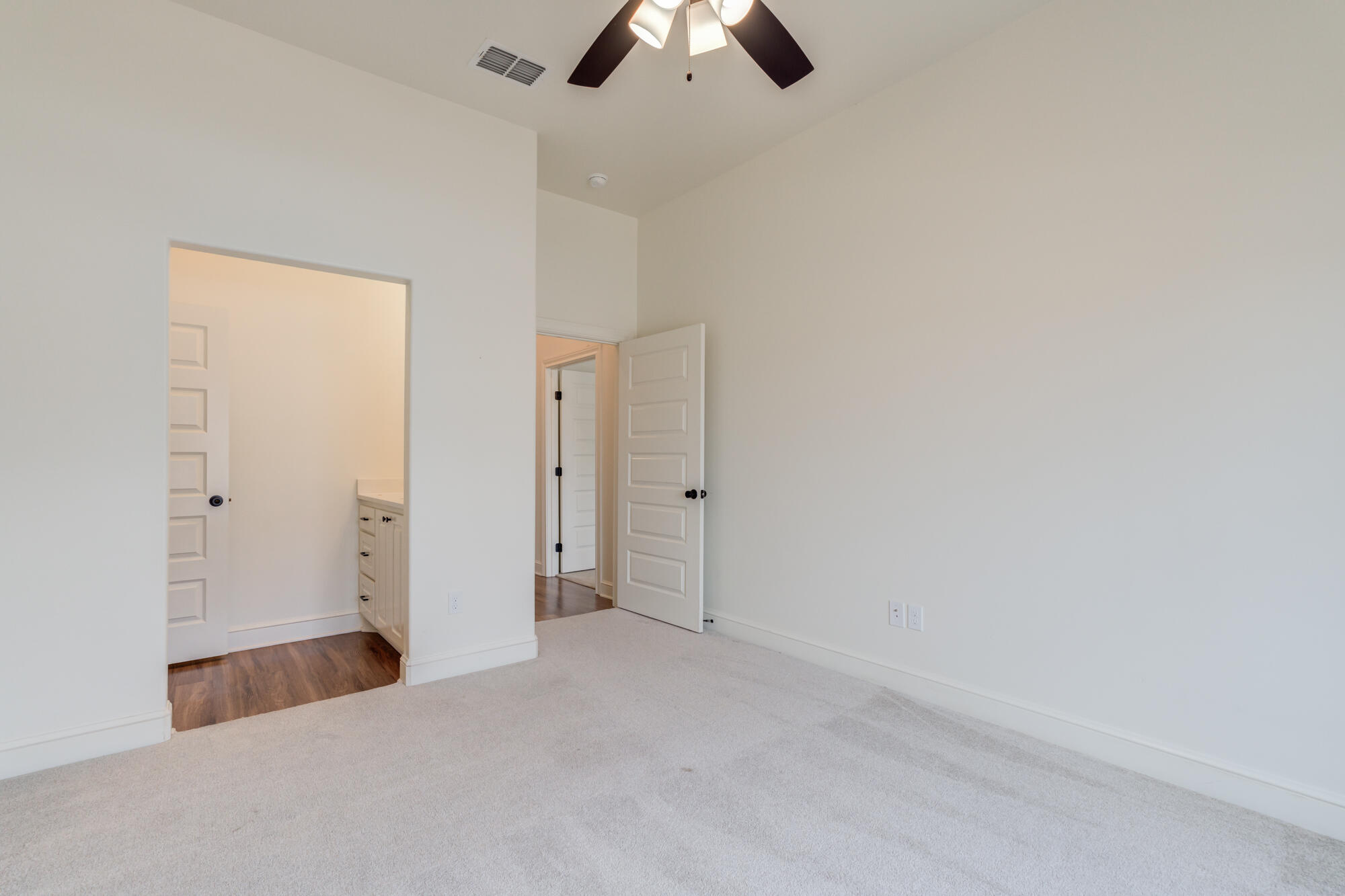 7603 52nd Street Lubbock, TX 79407 - Photo 39 of 46 a view of an empty room and chandelier fan