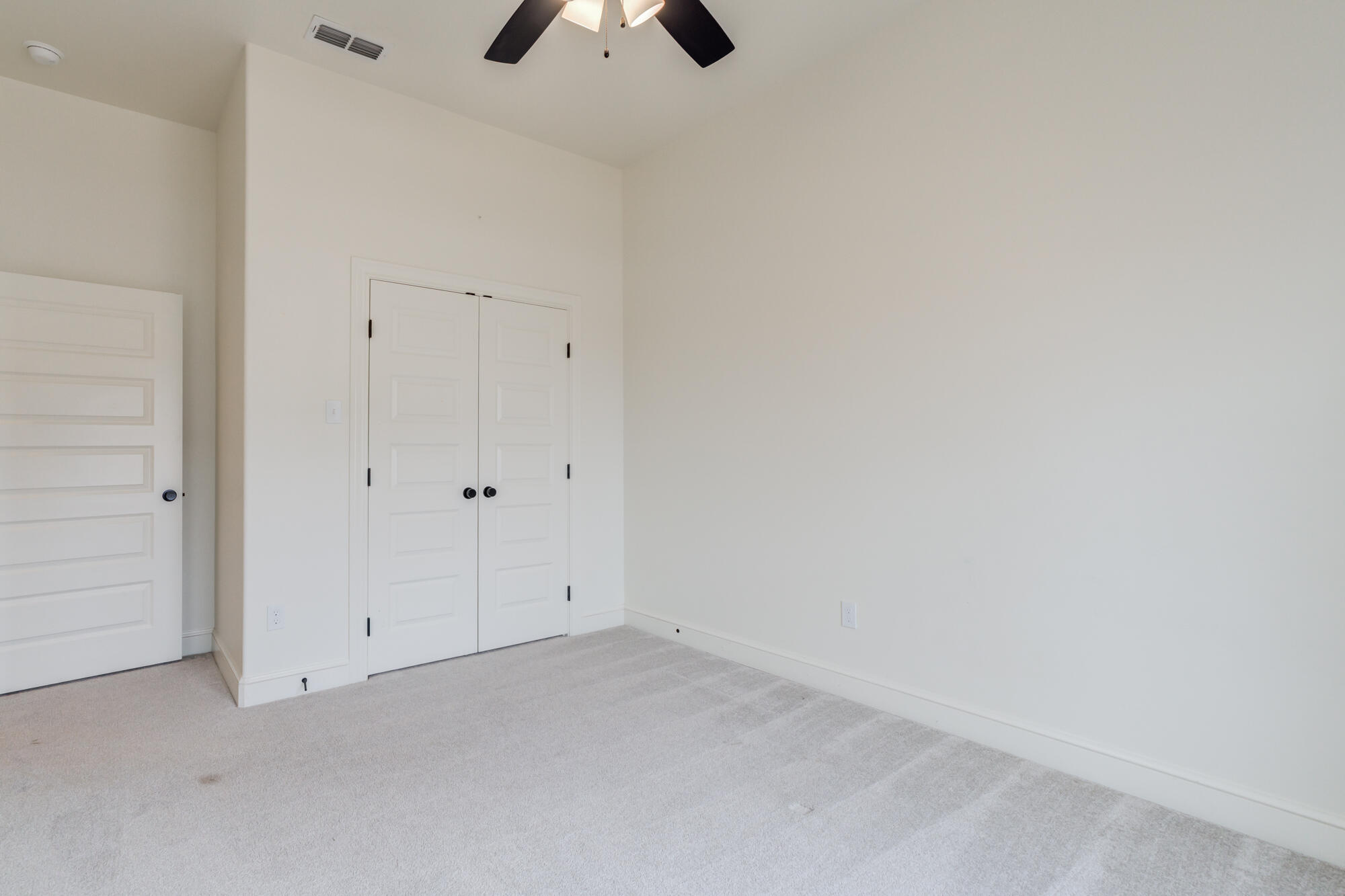 7603 52nd Street Lubbock, TX 79407 - Photo 41 of 46 an empty room with chandelier fan