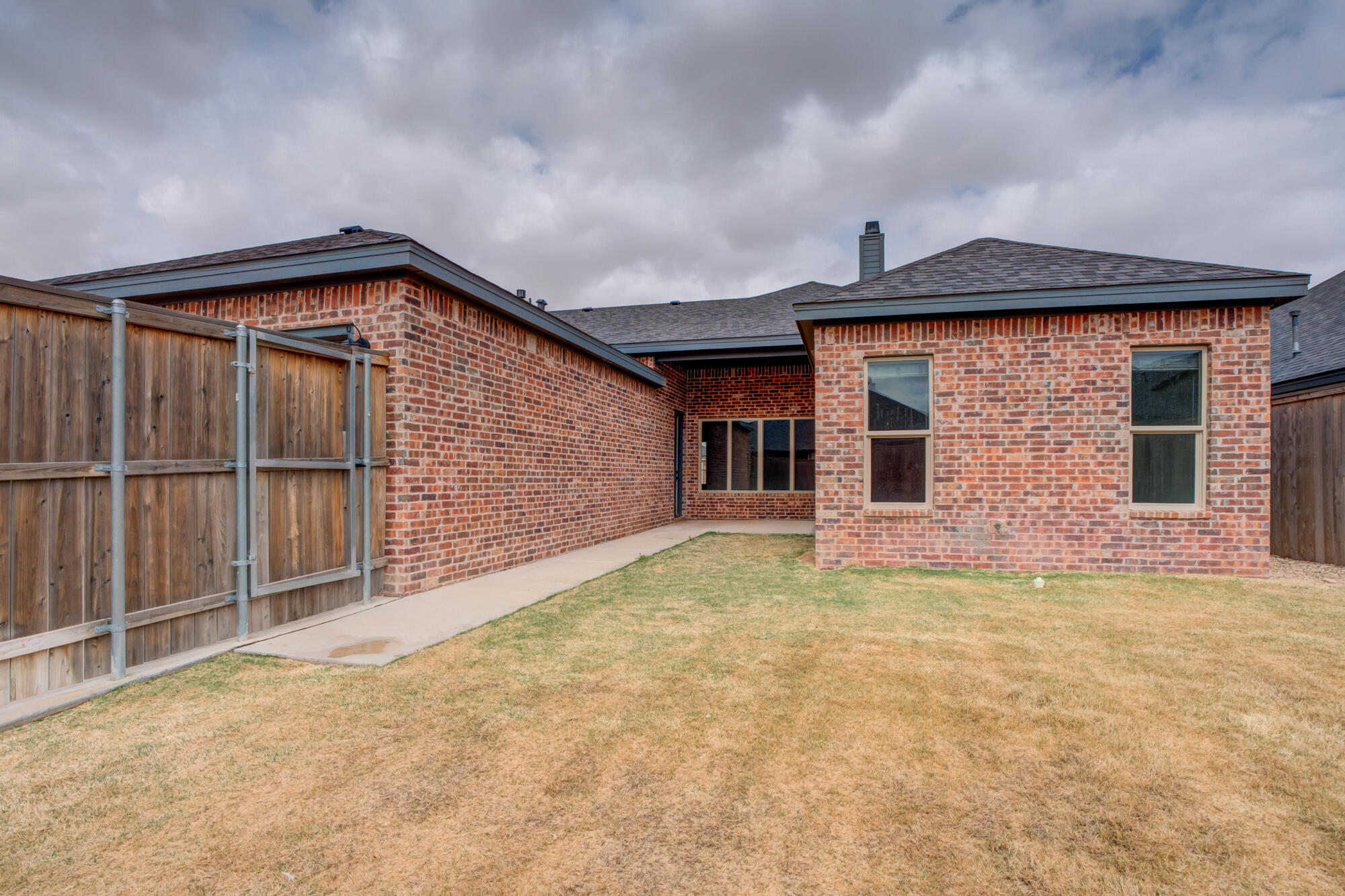 7603 52nd Street Lubbock, TX 79407 - Photo 46 of 46 a front view of a house with plants