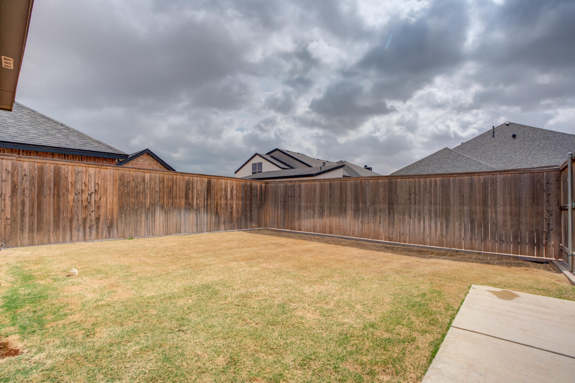 7603 52nd Street Lubbock, TX 79407 - Photo 5 of 46 a backyard of a house