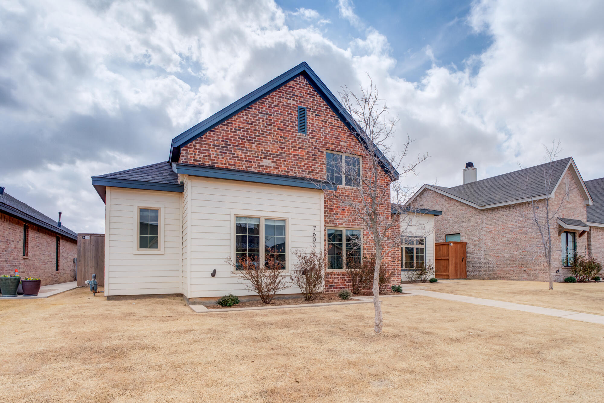 7603 52nd Street Lubbock, TX 79407 - Photo 7 of 46 a view of a house with a patio