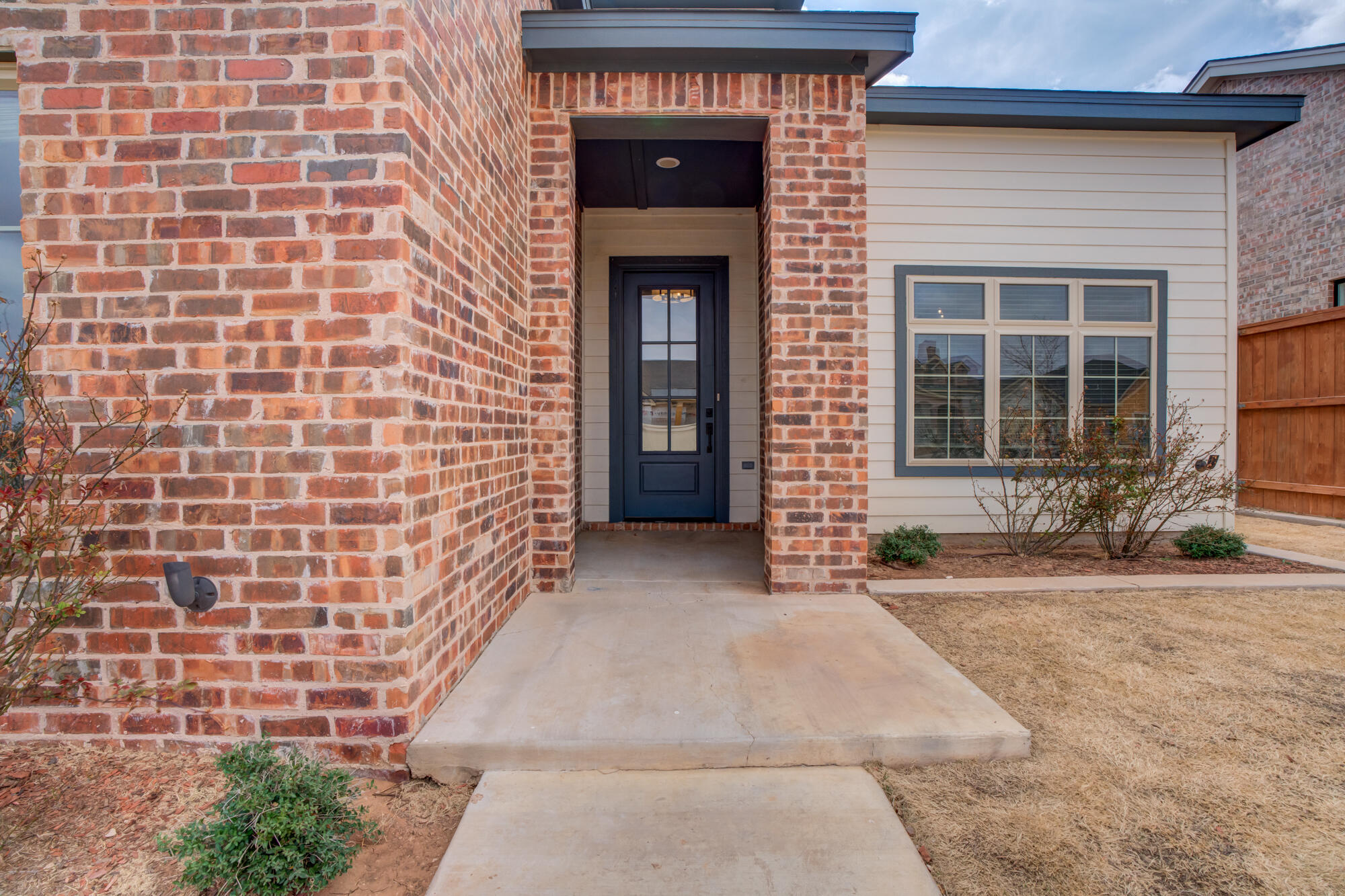 7603 52nd Street Lubbock, TX 79407 - Photo 8 of 46 a front view of a house with a yard