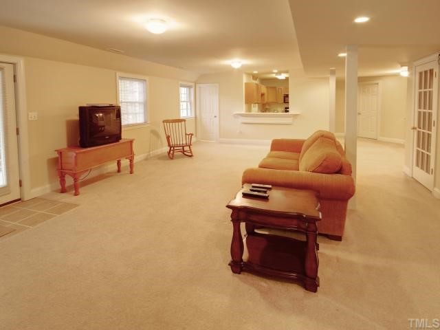 6625 Coach Light Circle Raleigh, NC 27613 - Photo 9 of 12 Large basement makes a perfect in law suite. This is the basement bonus/family room .
