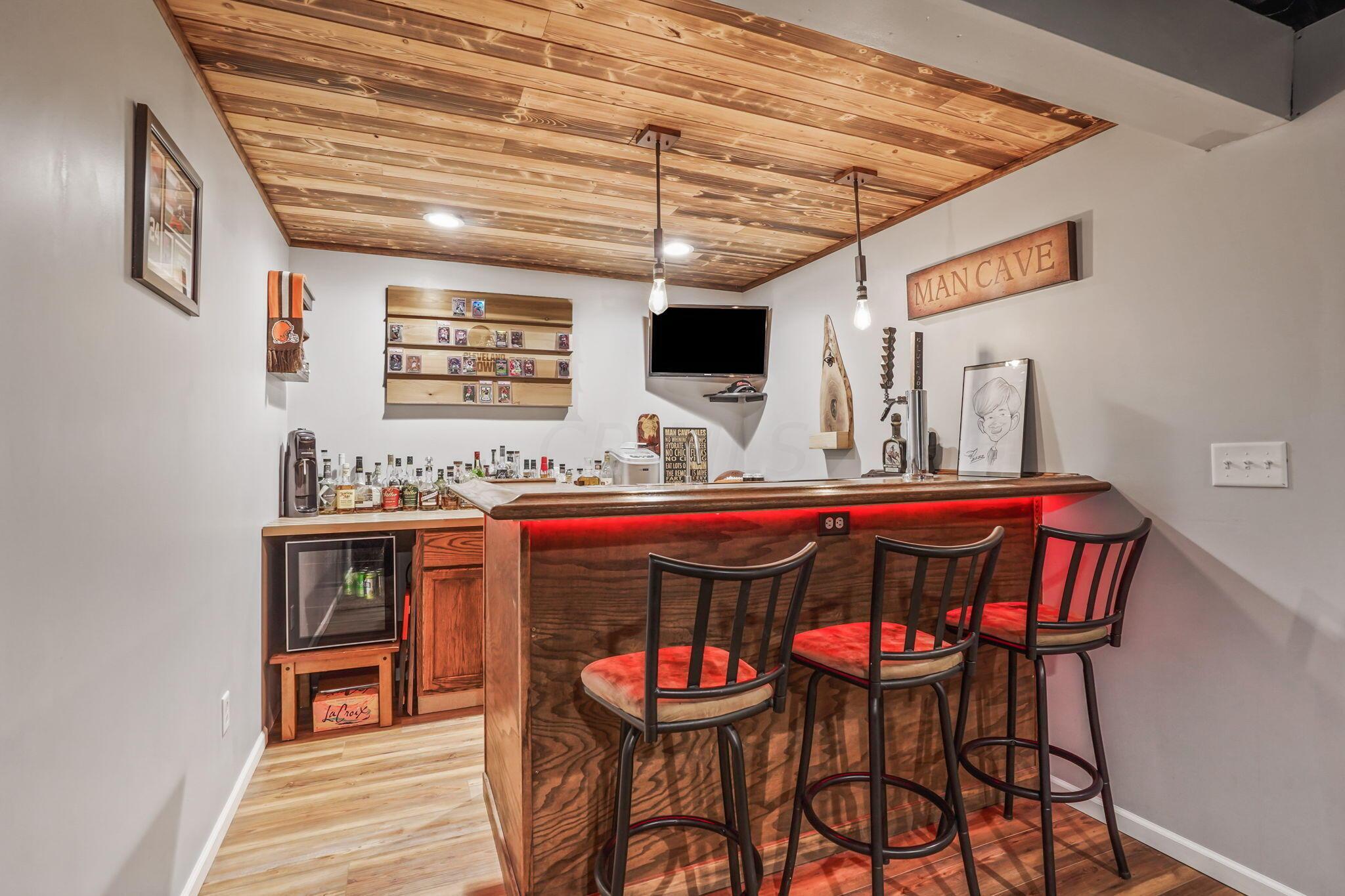 3325 Braumiller Road Delaware, OH 43015 - Photo 22 of 42 Custom made bar in finished lower level