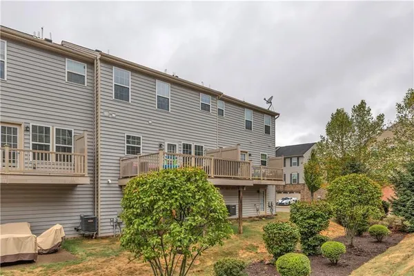 a house view with a outdoor space