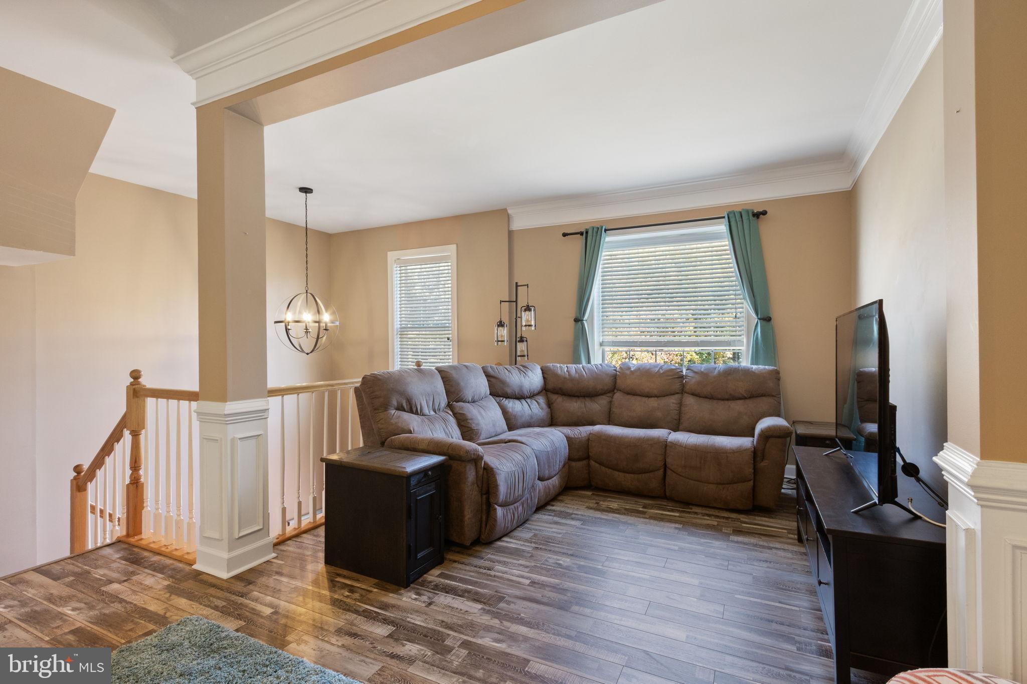 15636 Avocet Loop Woodbridge, VA 22191 - Photo 12 of 60 a living room with furniture window and wooden floor