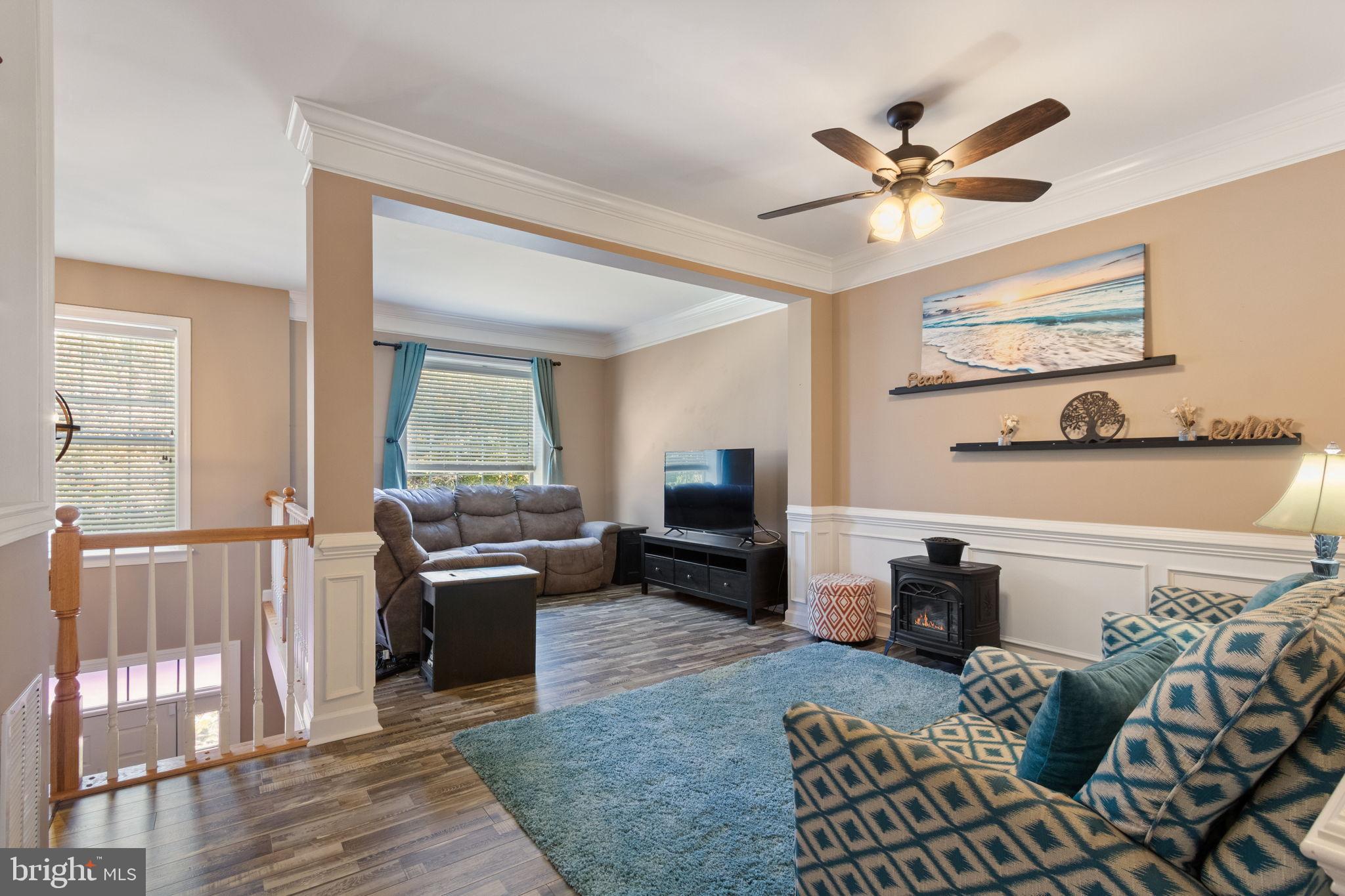 15636 Avocet Loop Woodbridge, VA 22191 - Photo 15 of 60 a living room with furniture and wooden floor