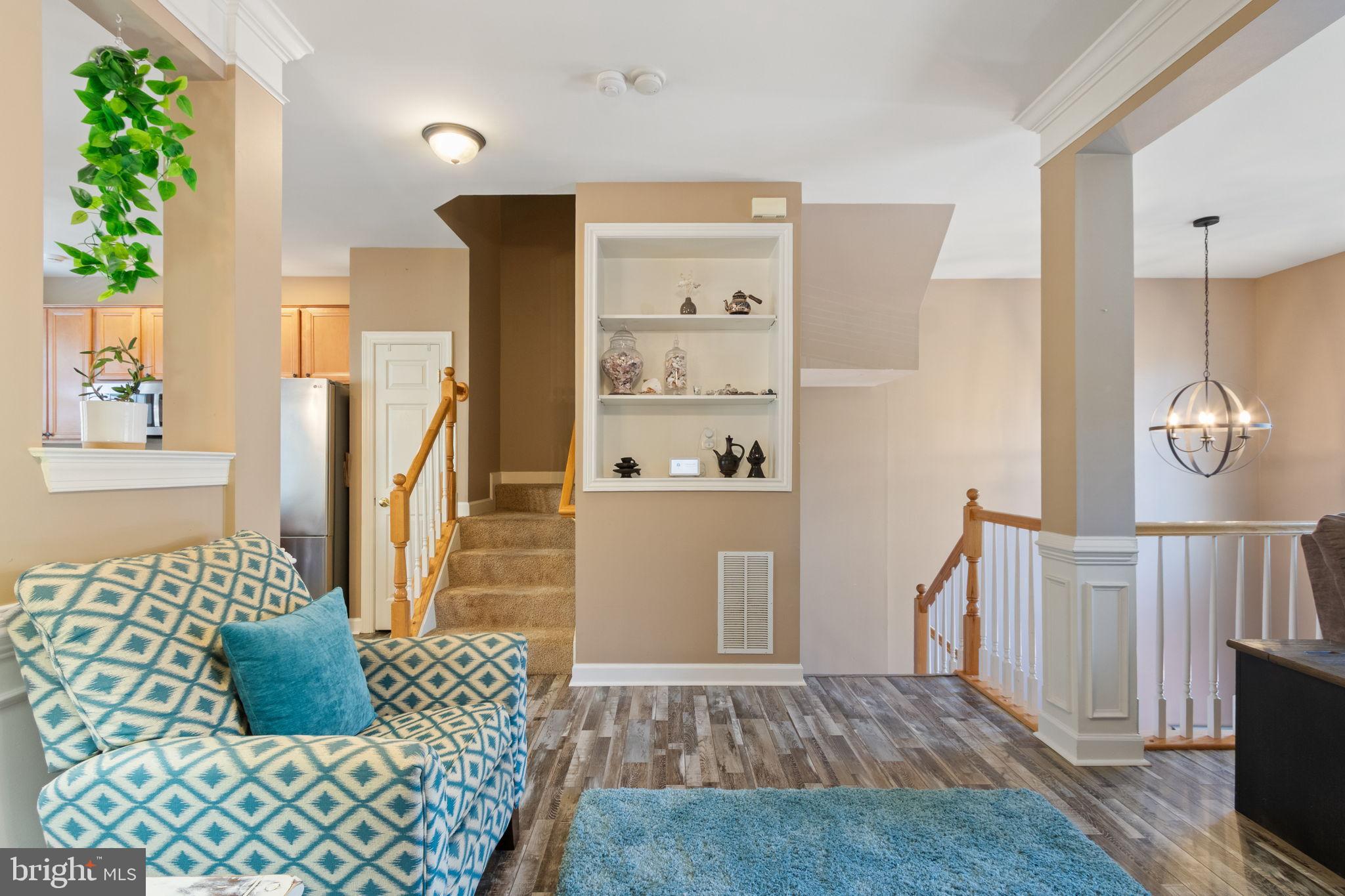 15636 Avocet Loop Woodbridge, VA 22191 - Photo 16 of 60 a living room with furniture and a rug