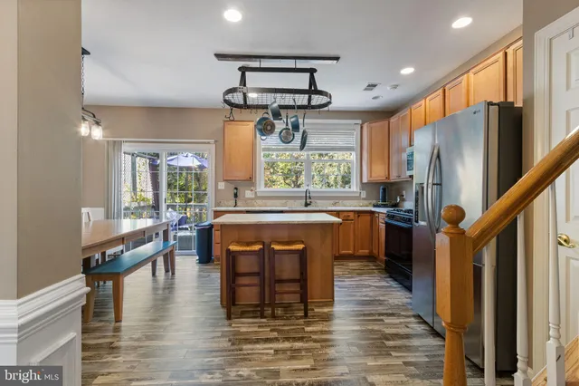a dining room with furniture window wooden floor