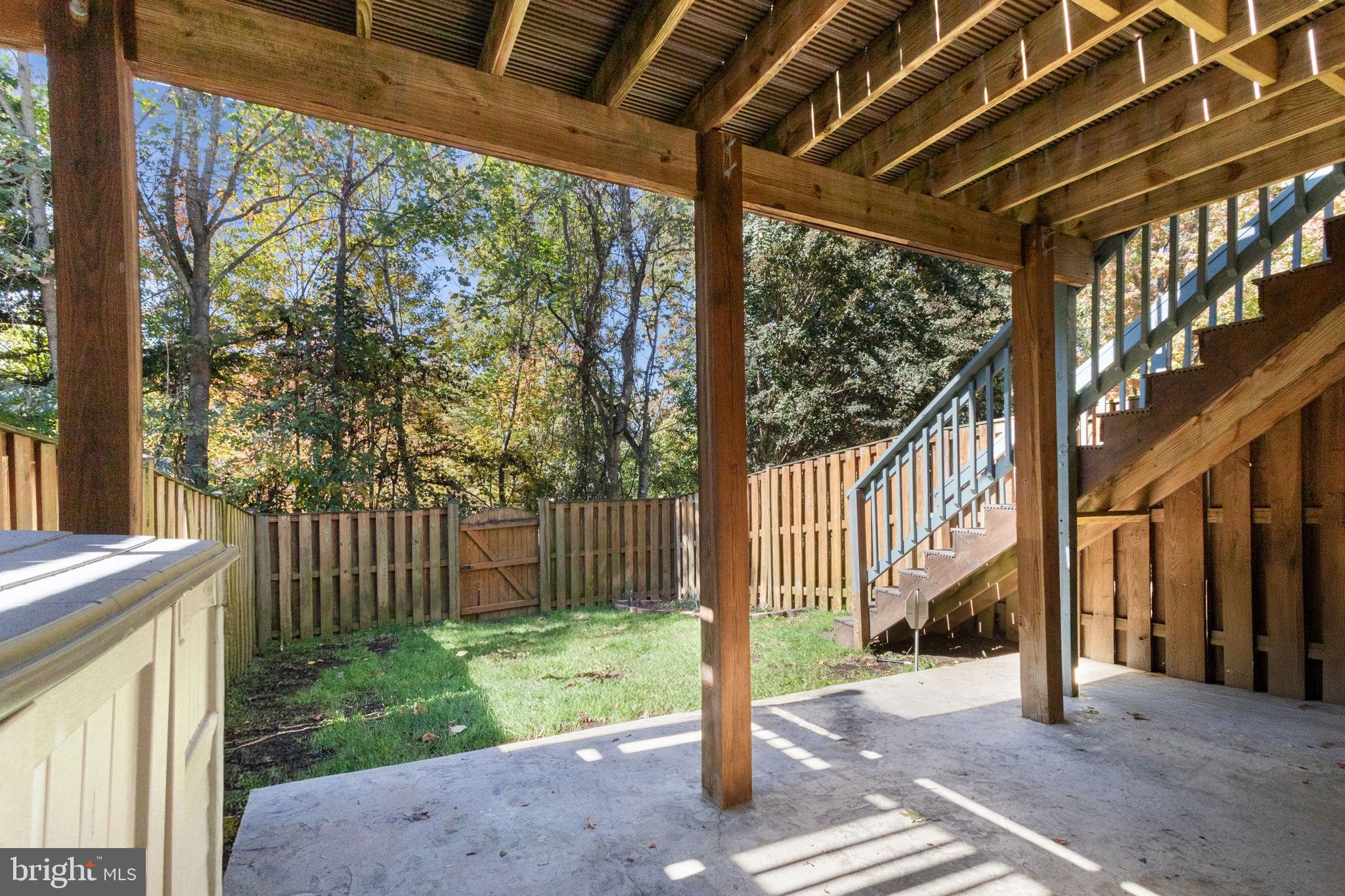 15636 Avocet Loop Woodbridge, VA 22191 - Photo 25 of 60 a front view of a house with a garden and plants