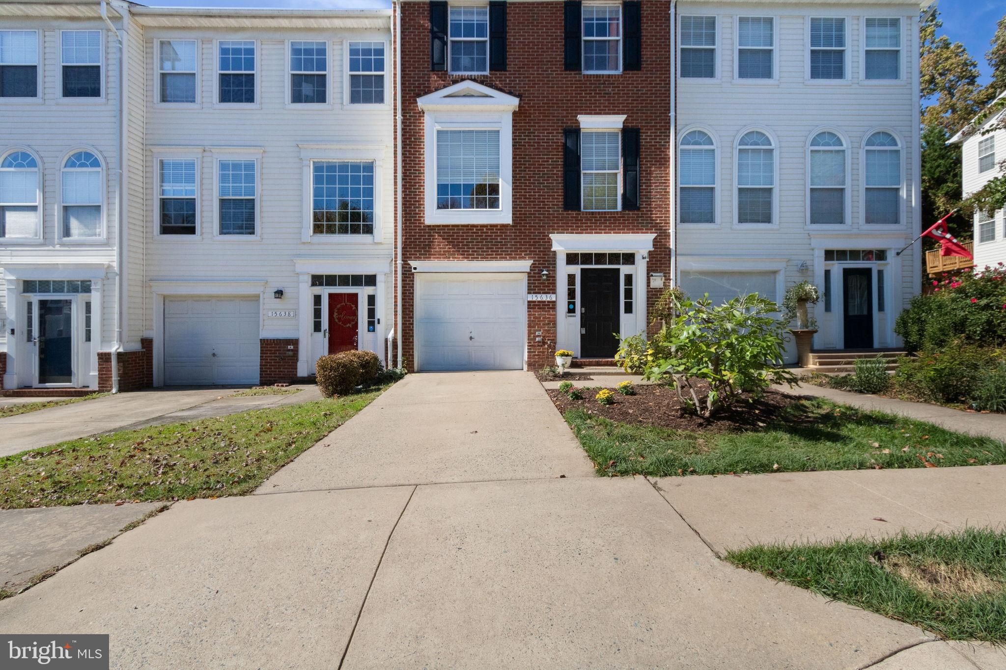 15636 Avocet Loop Woodbridge, VA 22191 - Photo 3 of 60 Charming townhomes with inviting facades.
