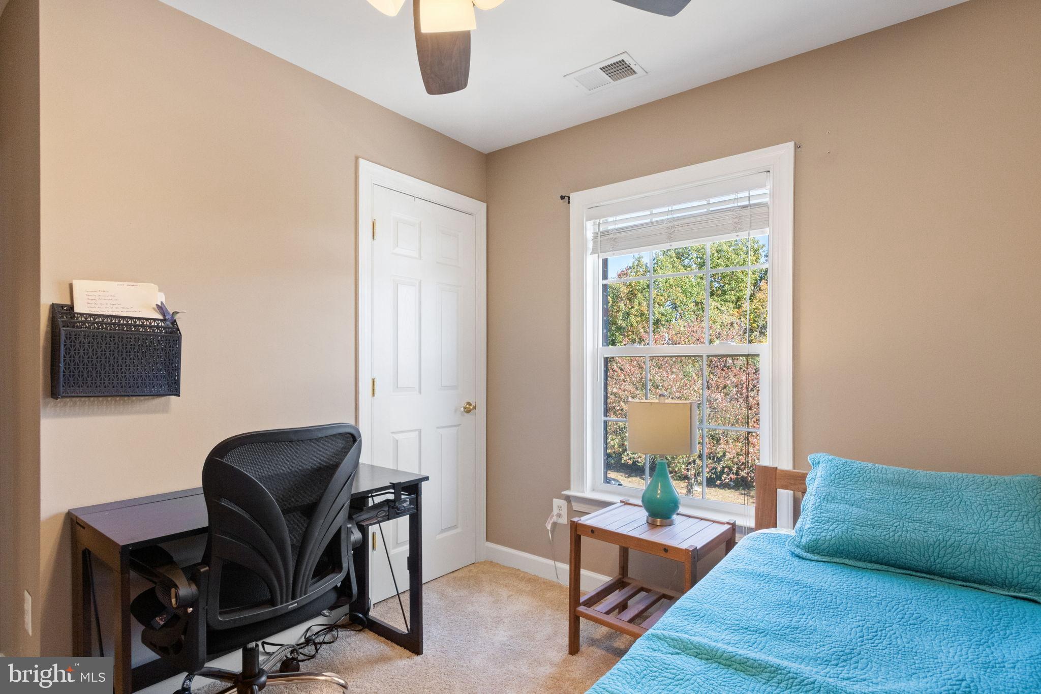 15636 Avocet Loop Woodbridge, VA 22191 - Photo 32 of 60 a living room with furniture and a window
