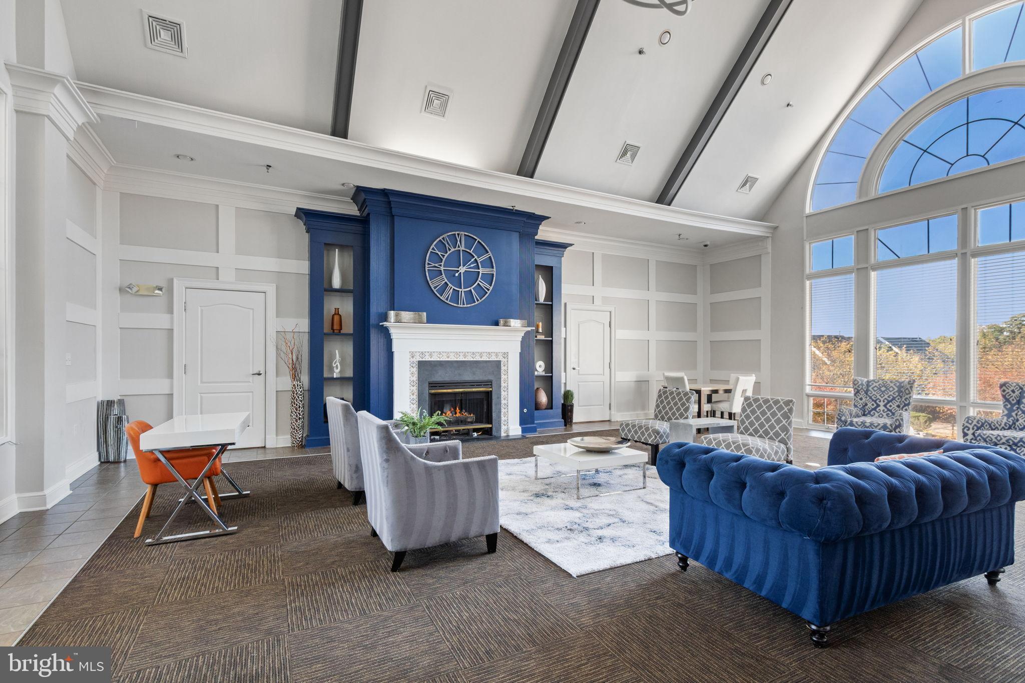 15636 Avocet Loop Woodbridge, VA 22191 - Photo 44 of 60 a living room with furniture and a fireplace