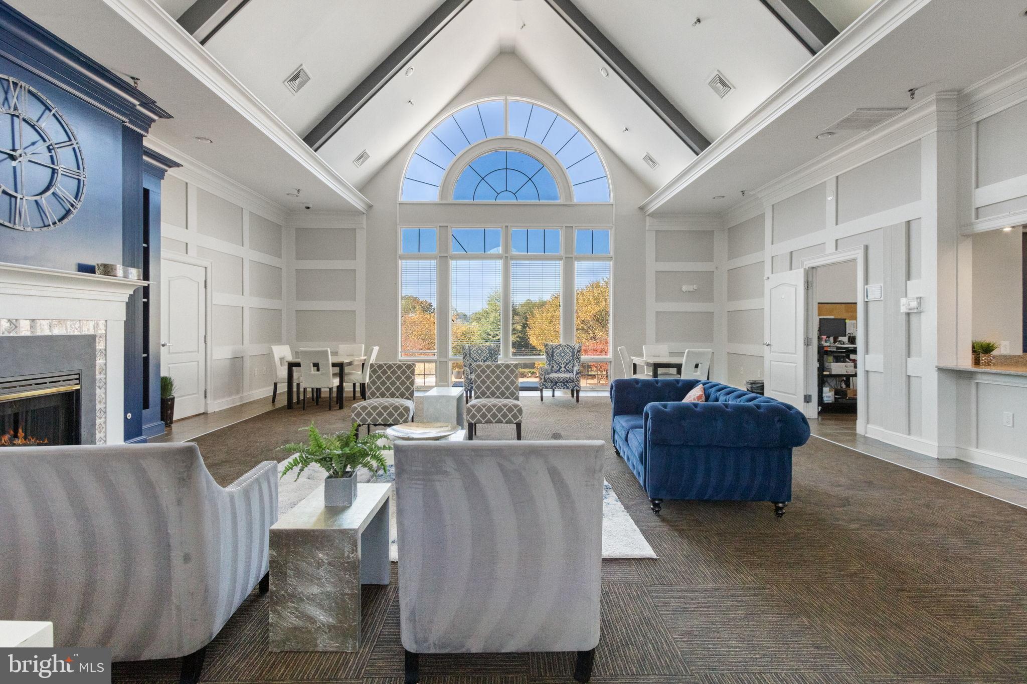 15636 Avocet Loop Woodbridge, VA 22191 - Photo 46 of 60 a living room with fireplace furniture and a large window