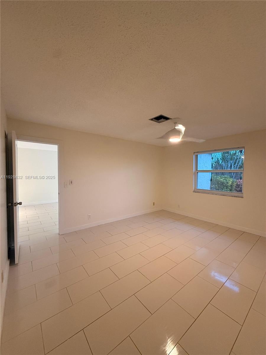 13741 Flora Place, Unit B Delray Beach, FL 33484 - Photo 18 of 50 an empty room with a empty space