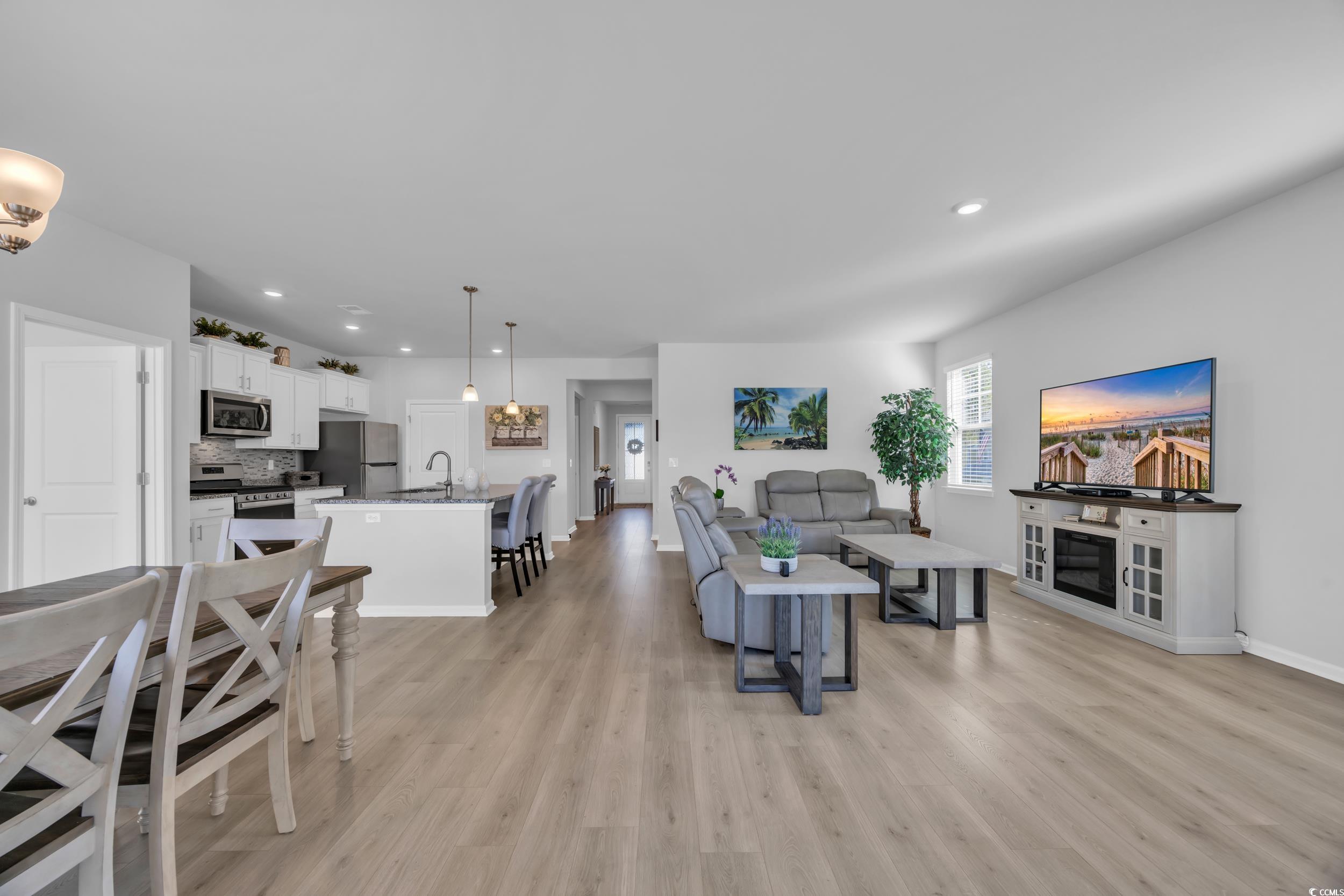 223 Juniata Loop Little River, SC 29566 - Photo 13 of 39 Living room with baseboards, recessed lighting, an
