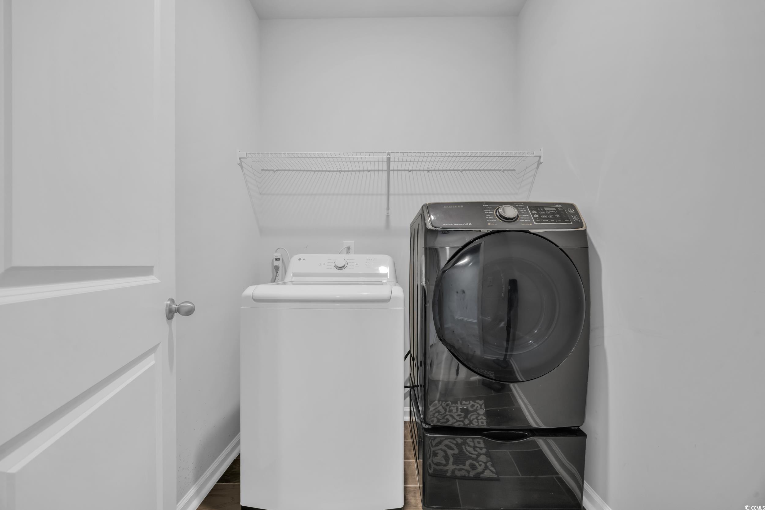 223 Juniata Loop Little River, SC 29566 - Photo 24 of 39 Clothes washing area with baseboards, washing mach